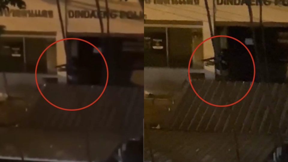 A video clip shows that a police officer inside the Dindaeng Police Station shot at a protester.
