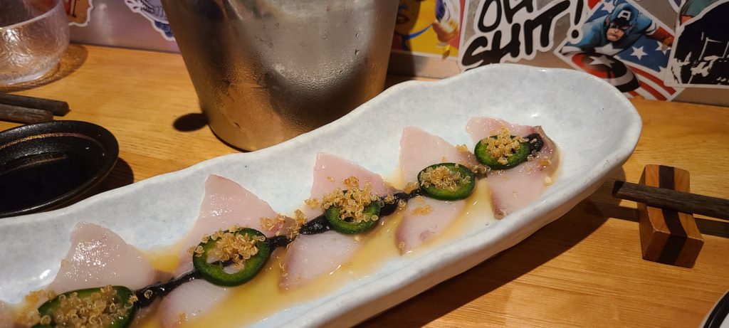 The Hamachi, with tangerine ponzu, black sesame paste and crispy quinoa, was one of our favorites among the dishes we tried. Photo: Coconuts Media