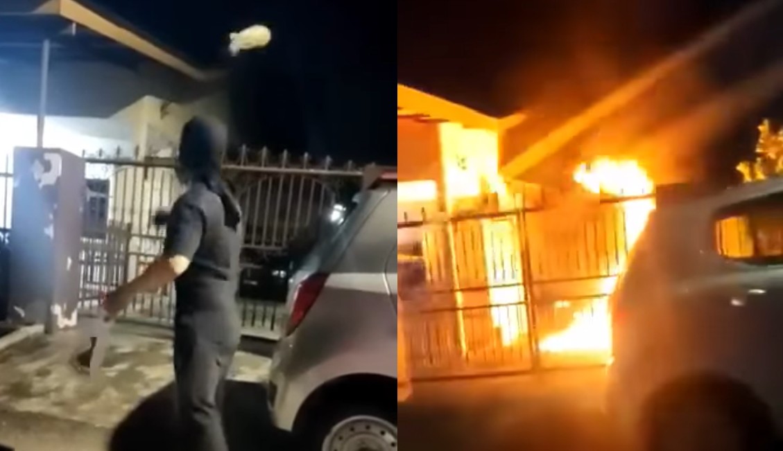 Man filmed setting someone’s place on fire in Johor. Photo: Kluang News/Facebook