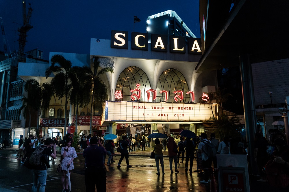 Cinemagoers in front of Scala cinema in early July 2020 during its last week of operation. Photo: Coconuts Bangkok
