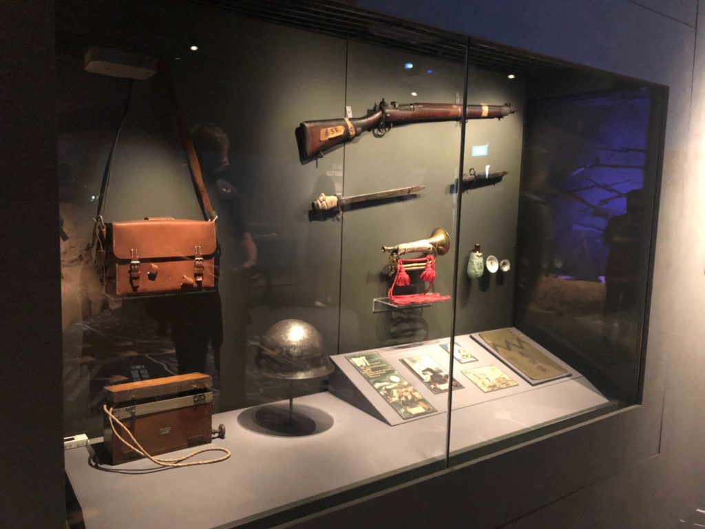 Items owned by the Japanese, including a portable radio, propaganda materials, and a rifle.