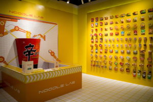 The playground’s noodle lab and the wall of instant noodles. Photo: Carolyn Teo/Coconuts