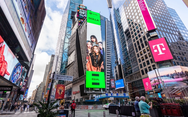 Dolla on the New York Times Square billboard. Photo: Dolla/Twitter
