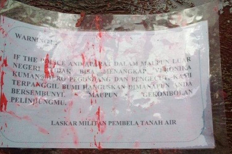 A note containing a threat found at the scene of the blast. Photo: Twitter