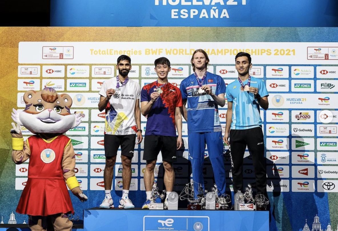 Singaporean badminton player Loh Kean Yew (in red and blue) shares the podium Sunday with three others at the BWF World Championships in Huelva, Spain. Photo: Loh Kean Yew/Instagram