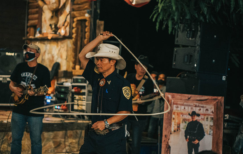 Trick roping for the fans. Photo: Tyler Roney / Coconuts Bangkok