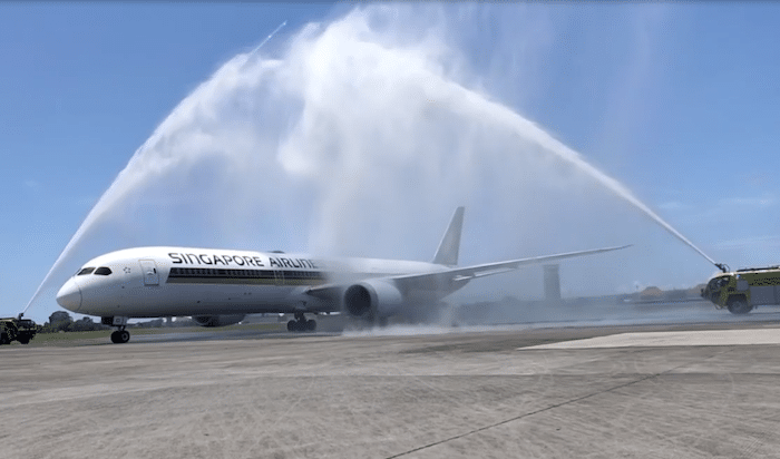 Singapore Airlines flight SQ938 ⁠— the airline’s first plane to touch down in Bali in nearly 2 years ⁠— given a water salute at the Ngurah Rai Airport on Feb. 16, 2022. Photo: Video screengrab from Instagram/@protocol_act