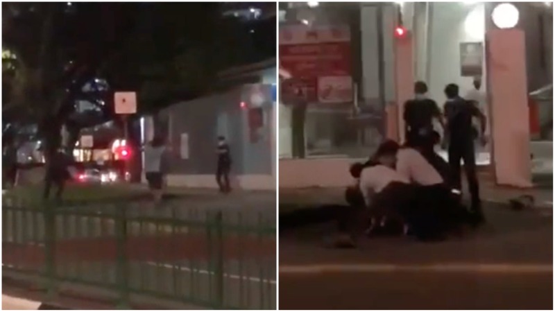  At left, a man wearing white charges at a police officer just outside the Clementi Police Division on Feb. 17. At right, he is on the ground after being shot in the arm. Photo: Je7792/Reddit
