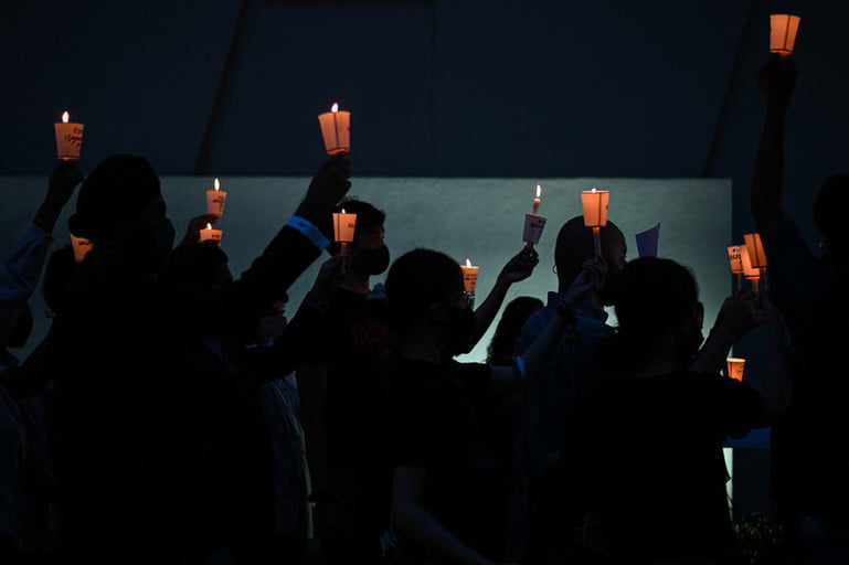 Protesters hold a candle light vigil last night outside Singapore’s embassy in Kuala Lumpur. Photo: Amnesty International Malaysia
