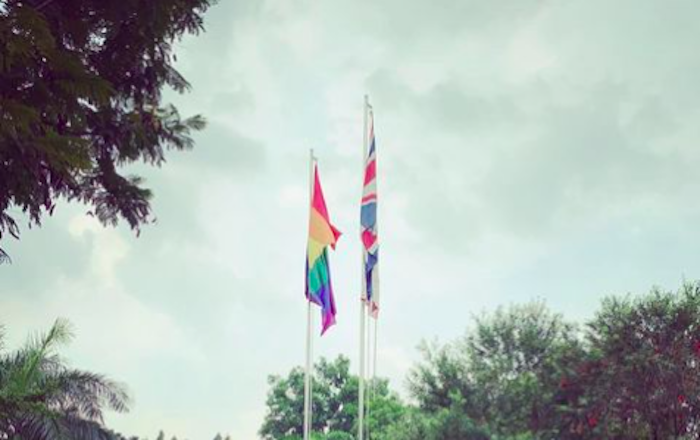 An LGBT+ flag flying next to the Union Jack at the British Embassy in Jakarta. Photo: Instagram/@ukinindonesia