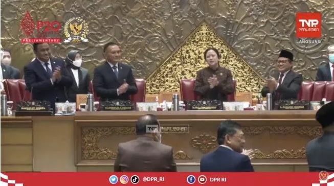 Video screengrab showing House Speaker Puan Maharani celebrating her birthday during a session in parliament while protesters were outside demanding the lowering of fuel prices.