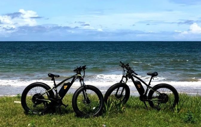 File phot of e-bikes parked at Sanur Beach. Photo: Facebook/EzyRiders.
