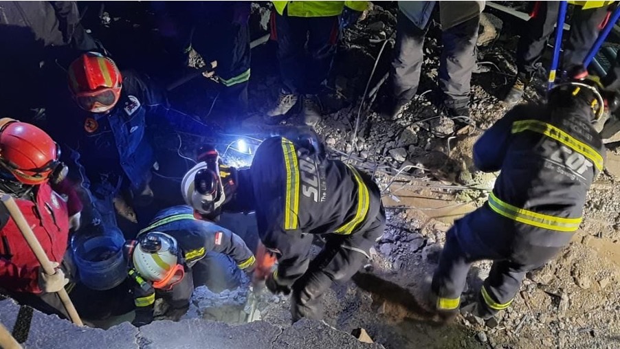 The SCDF team, a Spanish team and a Turkey team breaking into rubble at the rescue site. Photo: SCDF/Facebook
