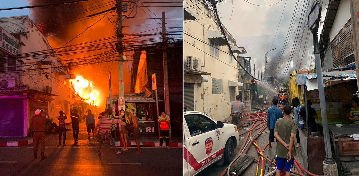 Firefighters and rescue personnel from the Talat Phlu Fire Station work to quell flames that engulfed multiple homes in Soi Wutthakat 18 early this morning. The fire was put out at around 6am.